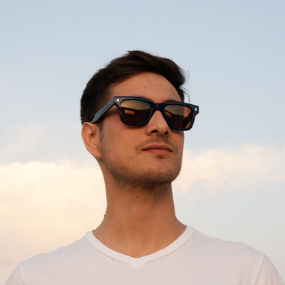 anteojos de sol cuadradados rectangulares polarizados de color negro para hombre y mujer de cara redonda de moda #color_carey