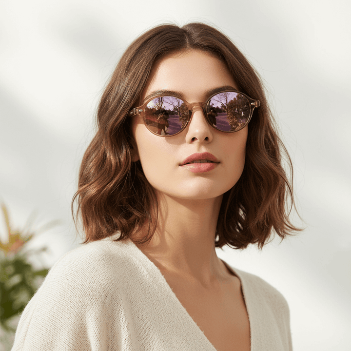 Front view a women round face wearing sunglasses polarized ovaladas color rose espejadas with color lenses pink mirrored modelo capri bonoboss. eyeglasses oval retro moda for men and women #color_rose
