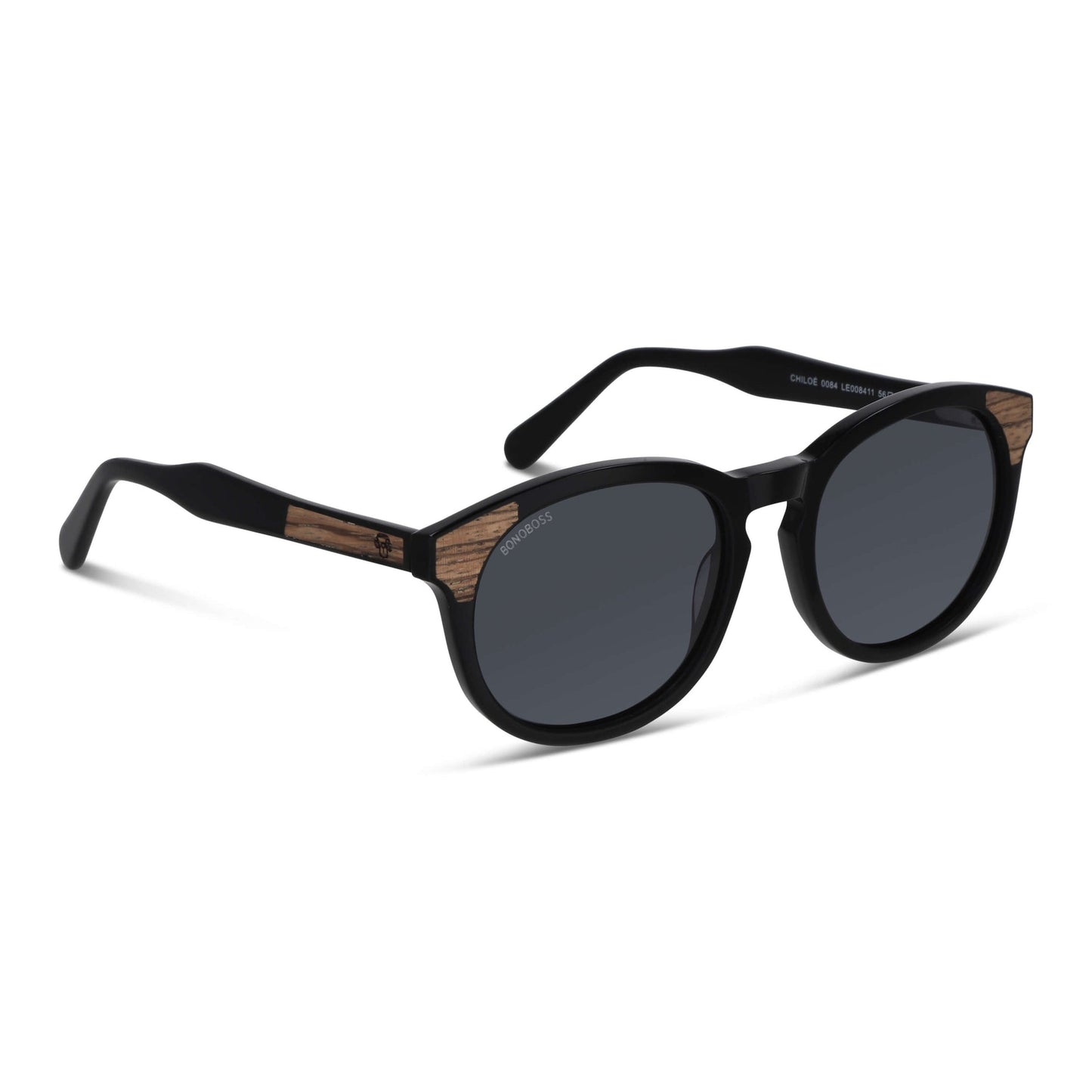lentes de sol polarizados para hombre y mujerovalados de color negro con patas de madera natural sustentable. Marco de plastico reciclado con lentes polarizadas #color_negro