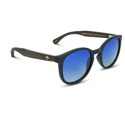 anteojos redondos de plástico reciclado y varillas de madera natural sustentable con lentes de color degradé azul. Polarizadas y forma redonda. #color_degrade-azul