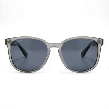 anteojos redondos de plástico reciclado y varillas de madera natural sustentable con lentes de color rosado. Polarizadas y forma redonda. La gafa es color transparente #color_negro