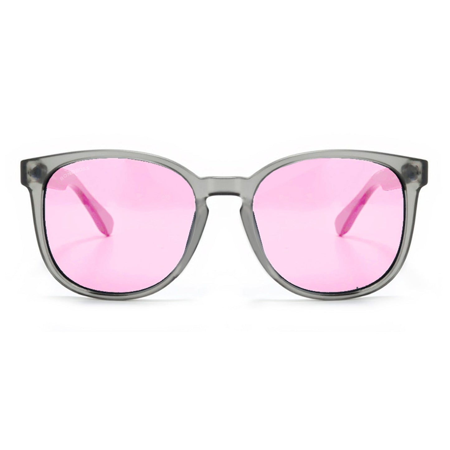 anteojos redondos de plástico reciclado y varillas de madera natural sustentable con lentes de color rosado. Polarizadas y forma redonda. La gafa es color transparente #color_rosado