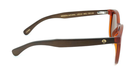 anteojos redondos de plastico reciclado y varillas de madera natural sustentable con lentes de color cafe polarizadas y forma redonda. la gafa es de color café vista lateral #color_brown
 