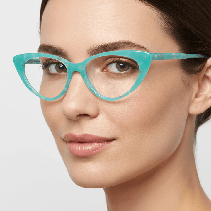 Angled view a women wearing optical frames frames color calipso and forma agatada retro and moda the marca bonoboss. forma queda bien in women round face large. #color_calipso