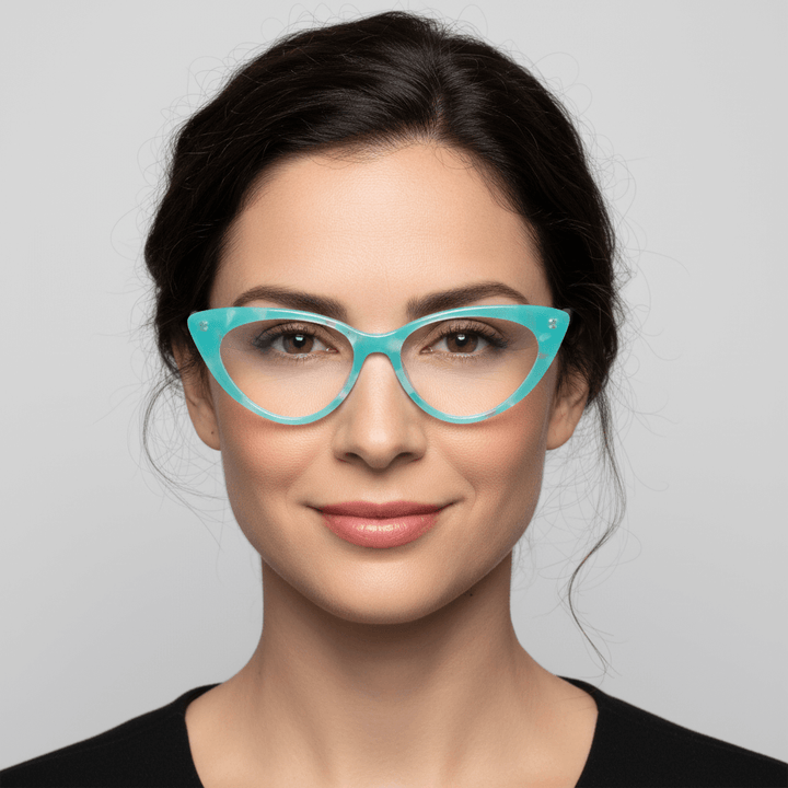 Front view a women round face wearing optical frames frames color calipso and forma agatada retro and moda the marca bonoboss. forma queda bien in women round face large. #color_calipso
