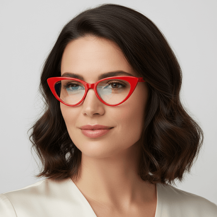 Angled view a women wearing eyeglasses optical frames forma agatada and red. the frames son sustainable acetate and the marca bonoboss #color_rojo
