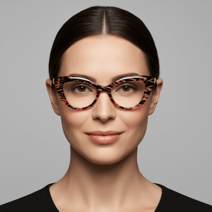 La front view a women round face and pelo castaño oscuro wearing unos optical frames exclusivos black red and amarillo the marca bonoboss fabricados in acetate biodegradable sustainable red #color_mosai