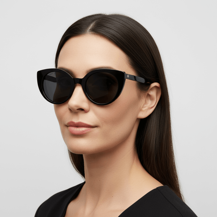 Side view a women pelo liso castaño wearing sunglasses gafa polarized forma agatada retro for men and women round face large Bonoboss #color_negro