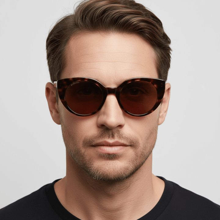 La front view a men peinado pelo castaño claro and barba sutil wearing eyeglasses agate pattern tortoise bonoboss in side view #color_carey