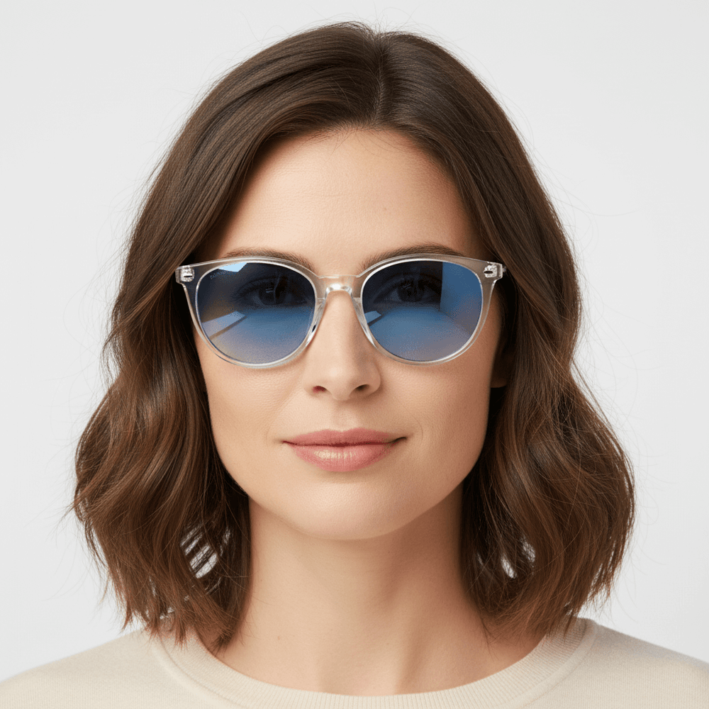 La front view a women with eyewear sunglasses polarized clears with color lenses gradient blue. estos lenses quedan bien in womenes and mens round face Bonoboss #color_transparente