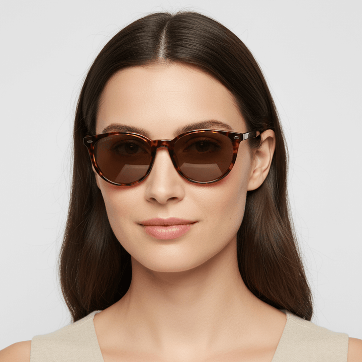 La front view unas women wearing eyewear sunglasses polarized tortoise with color lenses brown . estos lenses quedan bien in womenes and mens round face Bonoboss #color_carey