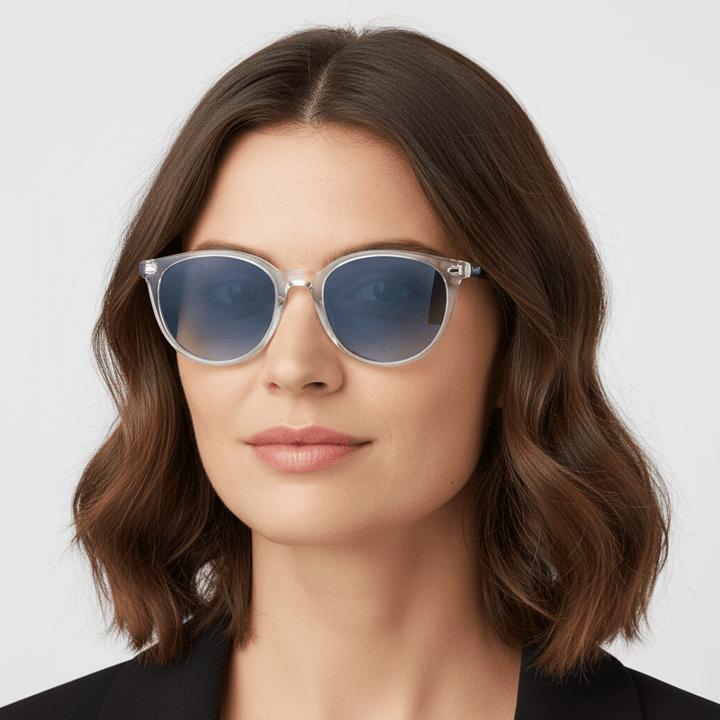 La side view a women with the pelo suelto wearing eyewear sunglasses polarized clears with color lenses gradient blue. estos lenses quedan bien in womenes and mens round face Bonoboss #color_transparente