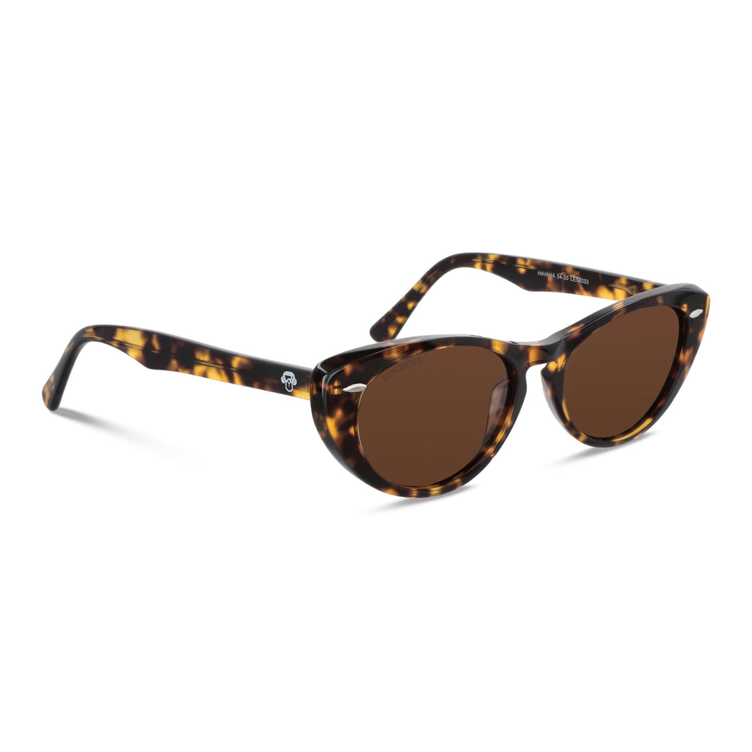 La side view unos sunglasses polarized bonoboss tortoise with lenses brown with puntos metalicos in the costados forma agatada and with a puente for a nariz ancha #color_carey