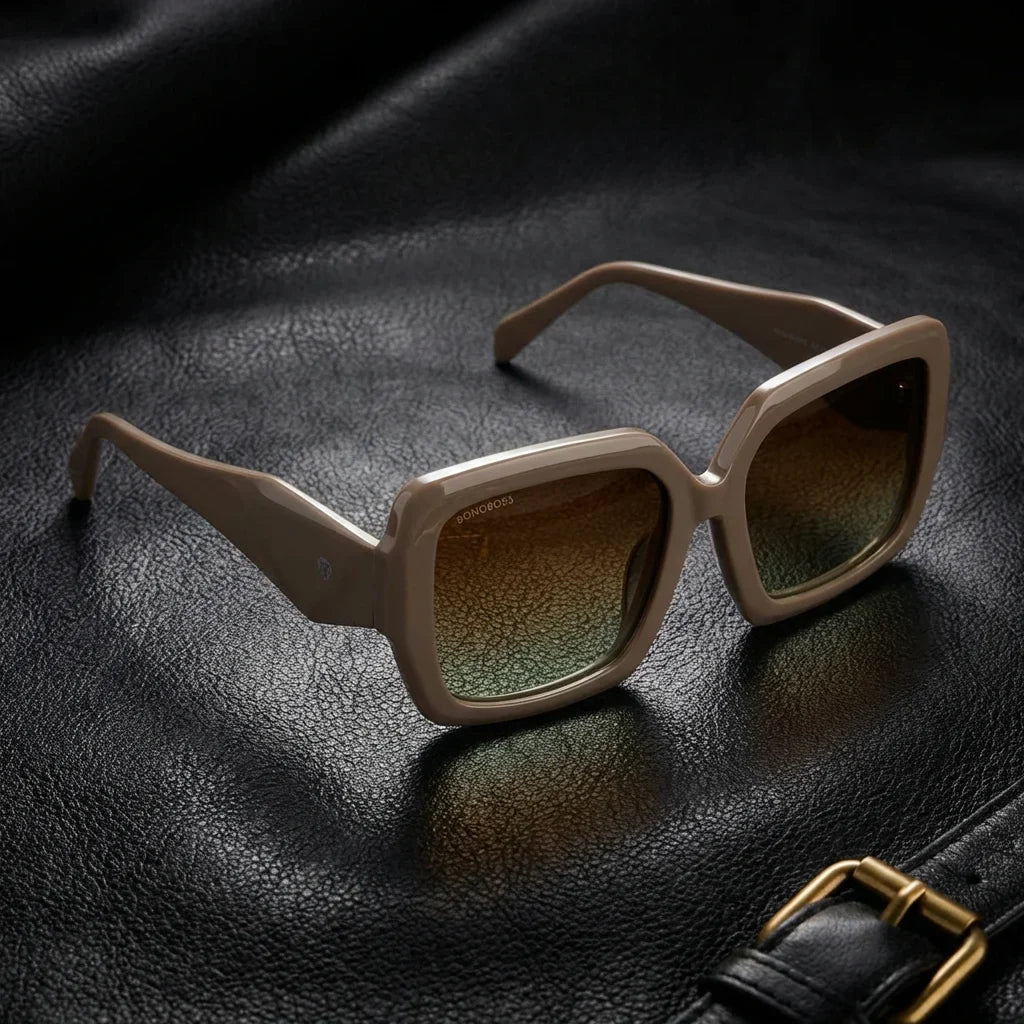 Lentes sol Alaska polarizados UV400 brown sobre cuero negro detalle brass premium Bonoboss #editorial_polarizado #color_brown