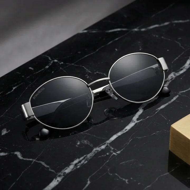 Lenses sun new lennon polarized UV400 bio-acetate silver sobre marmol black superficie premium elegante bonoboss #editorial_polarizado #color_silver