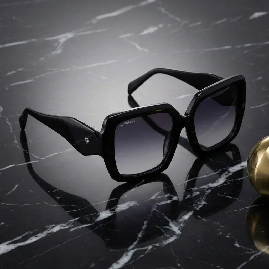 Lentes sol Alaska polarizados UV400 negro sobre marmol negro superficie elegante premium Bonoboss #editorial_polarizado #color_negro