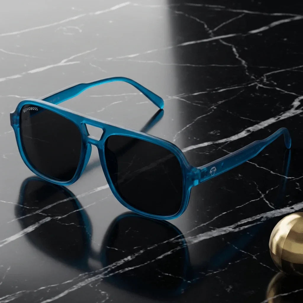 Lentes sol Orson RPET polarizados UV400 reciclado ocean sobre marmol negro contraste elegante vibrante Bonoboss #editorial_grid1 #color_ocean