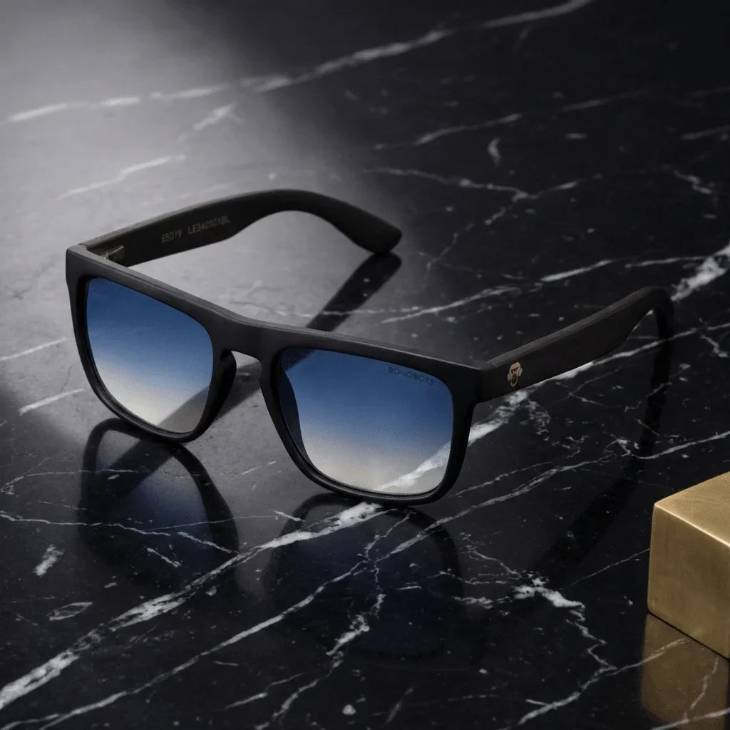 Lentes sol Lautaro Dark polarizados UV400 acetato degrade azul sobre marmol negro superficie elegante Bonoboss #editorial_polarizado #color_degrade-azul