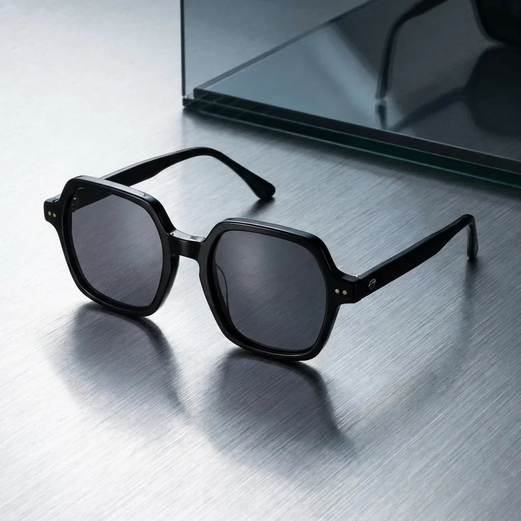 Lentes sol Canarias polarizados UV400 bio-acetato Negro sobre metal cepillado superficie industrial Bonoboss #editorial_grid1 #color_negro