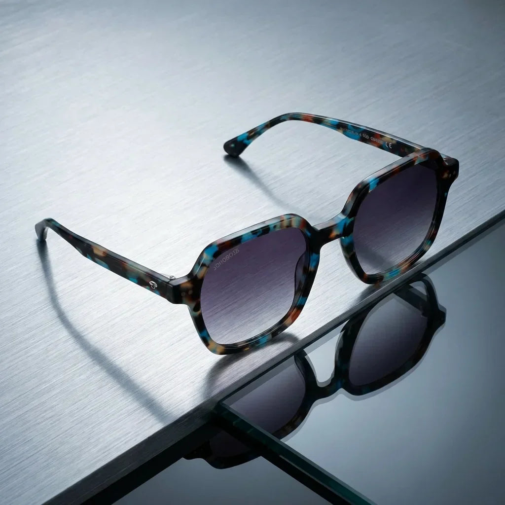 Lenses sun canarias polarized UV400 bio-acetate blue sobre brushed metal industrial surface bonoboss #editorial_grid1 #color_azul