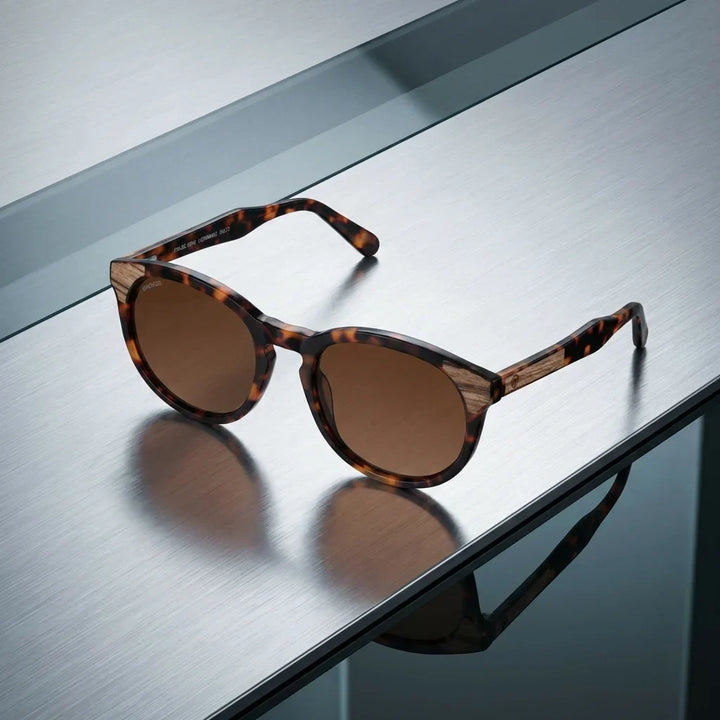Lenses sun chiloe 0084 polarized UV400 bio-acetate tortoise sobre brushed metal industrial surface premium bonoboss #editorial_polarizado #color_carey