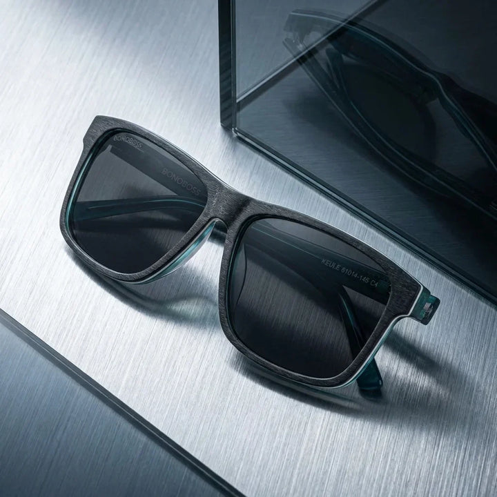 Lenses sun keule xl polarized UV400 wood darkblue sobre brushed metal industrial surface premium bonoboss #editorial_detail2 #color_darkblue