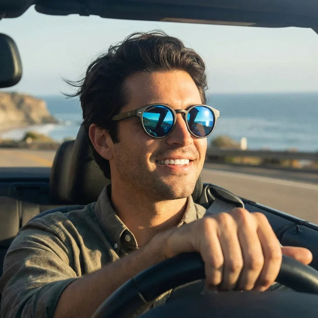 Hombre usando lentes sol Joplin RPET RPET reciclado del oceano polarizados espejado azul conduciendo proteccion solar UV400 carretera Bonoboss #editorial_banner #color_espejado-azul