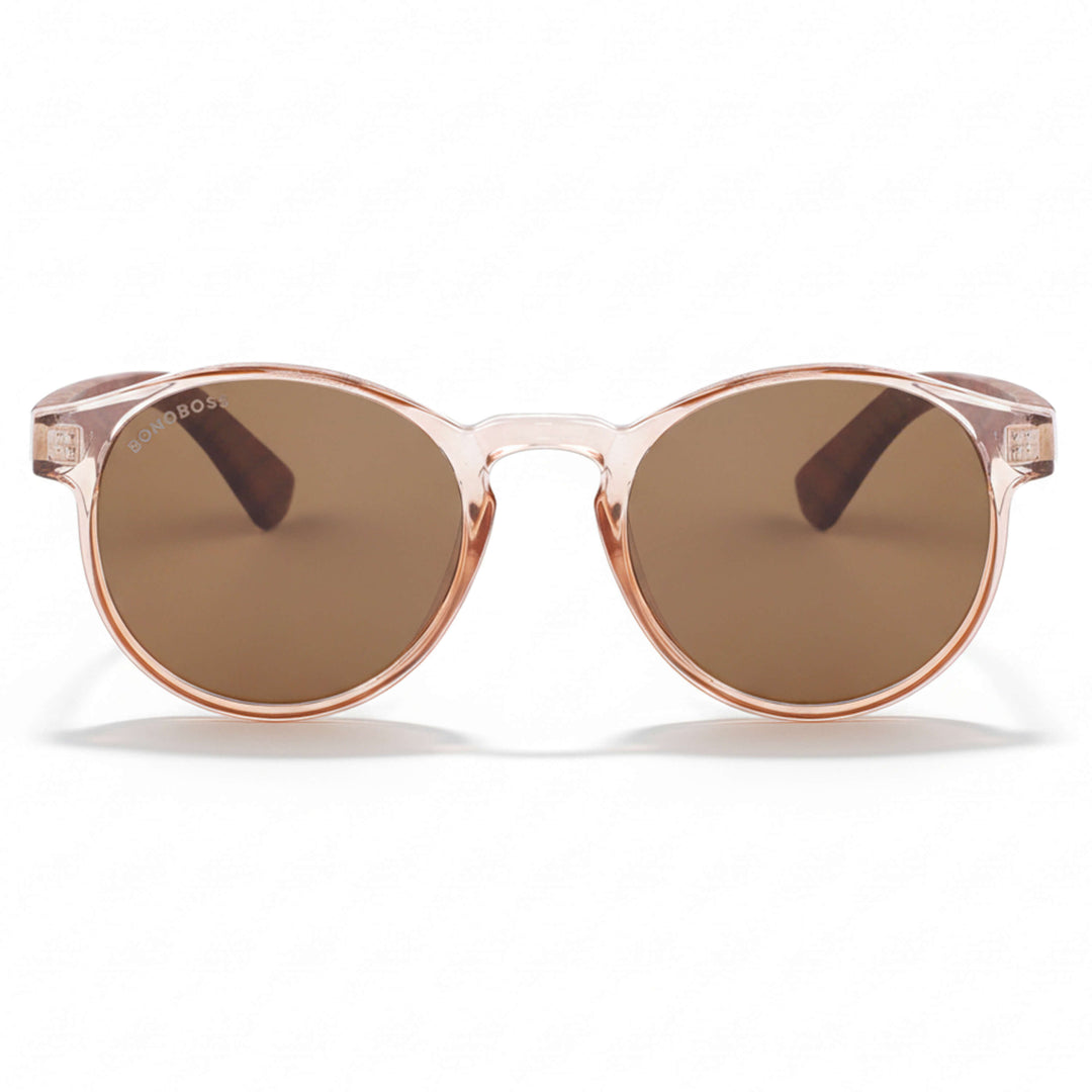 La front view unos eyeglasses eyeglasses sunglasses polarized forma redonda and with puente for narices anchas hechas recycled plastic sustainable ecologico personalizada and wooden temples de Bonoboss #color_rosa