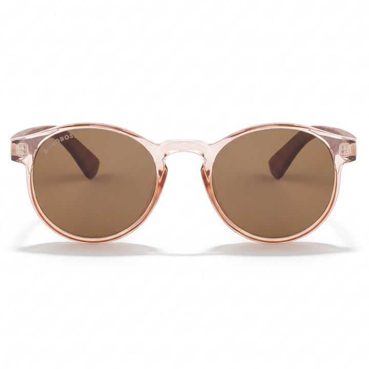 La front view unos eyeglasses eyeglasses sunglasses polarized forma redonda and with puente for narices anchas hechas recycled plastic sustainable ecologico personalizada and wooden temples de Bonoboss #color_rosa