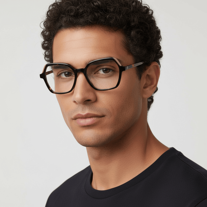 La side view a modelo men afroamericano wearing frames optical frames prescription and tratamiento anti-reflective forma cuadrada rectangular bonoboss in sustainable acetate recycled de #color_carey