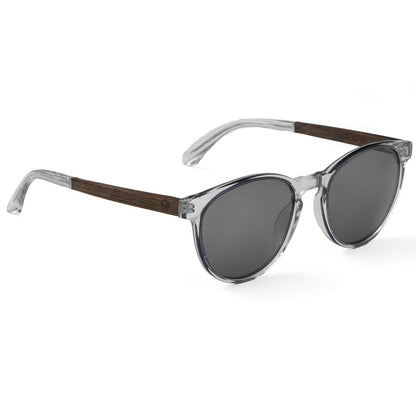 anteojos lentes de sol polarizados para hombre y mujer en material acetato biodegradable sustentable de moda para hombre y mujer forma redonda de color negro con patas de madera natural vista lateral #color_transparente
