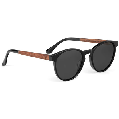 anteojos lentes de sol polarizados para hombre y mujer en material acetato biodegradable sustentable de moda para hombre y mujer forma redonda de color negro con patas de madera natural  vista lateral #color_black