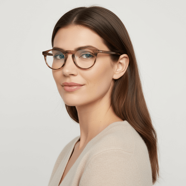 La side view a women cara ovalada large wearing frames optical frames prescription and anti-reflective bonoboss in sustainable acetate biodegradable forma redonda y #color_brown