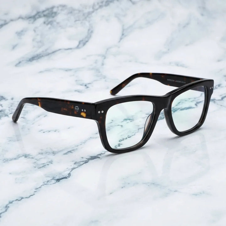 Lenses optical barcelona 1 tortoise sobre mármol white elegante frame premium bonoboss #editorial_armazon #color_carey
