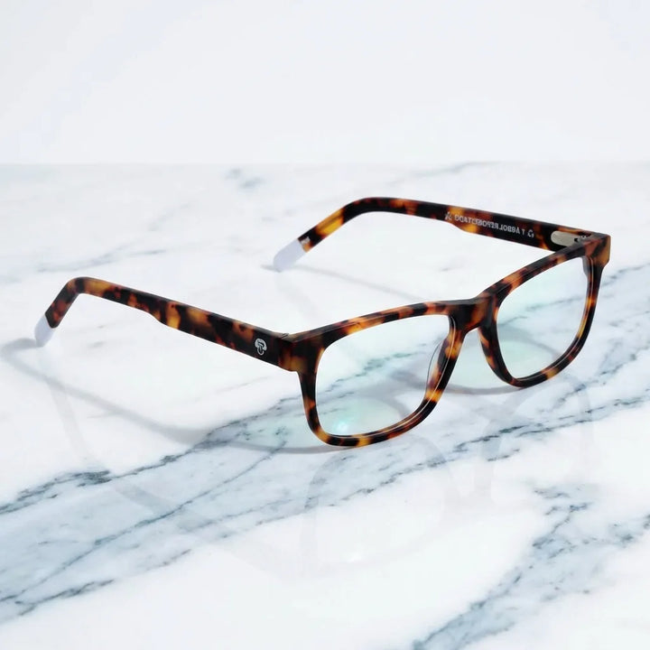 Lenses optical canelo tortoise sobre mármol white elegante frame premium bonoboss #editorial_armazon #color_carey