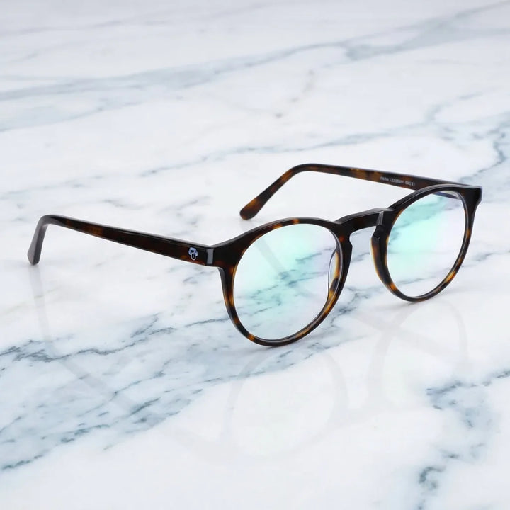 Lenses optical fran 1 tortoise sobre mármol white elegante frame premium bonoboss #editorial_armazon #color_carey