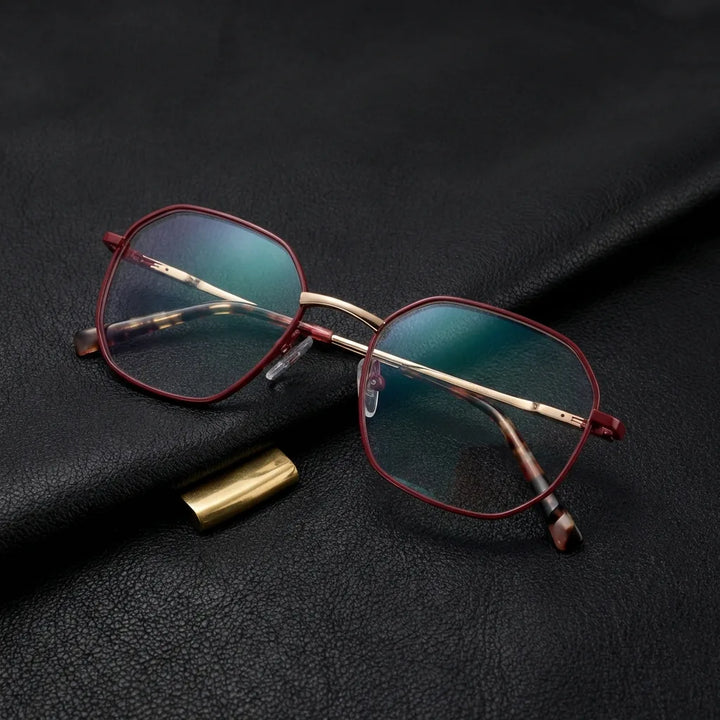 Lenses optical galapagos metal red sobre black leather with detalle brass gold calidad premium prescription bonoboss #editorial_banner_confianza #color_rojo