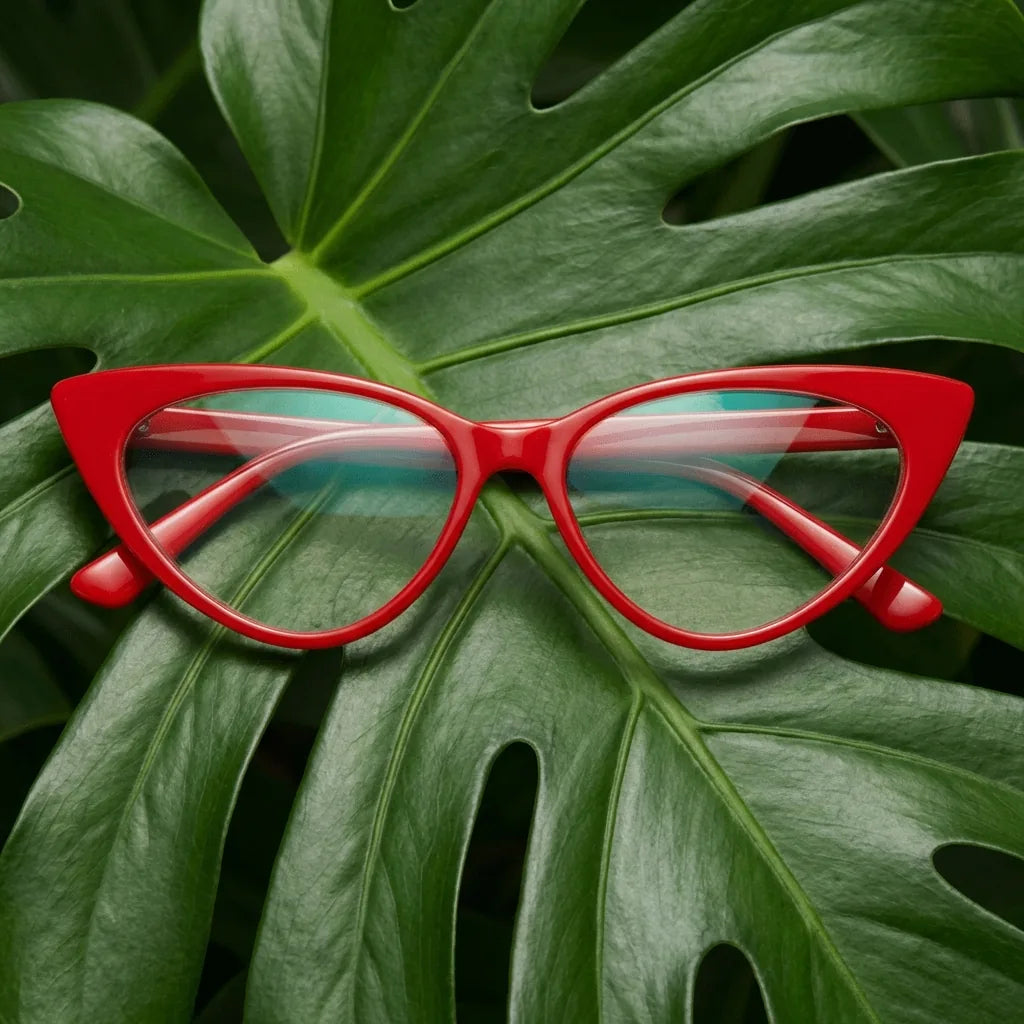Lenses optical hamburgo red entre hojas botánicas naturales diseño sustainable bonoboss #editorial_sustentabilidad #color_rojo