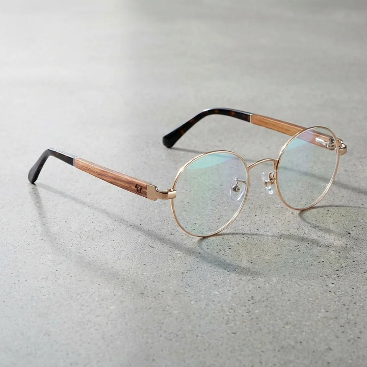 Lenses optical harry gold sobre concreto pulido minimalista frame premium bonoboss #editorial_armazon #color_dorado