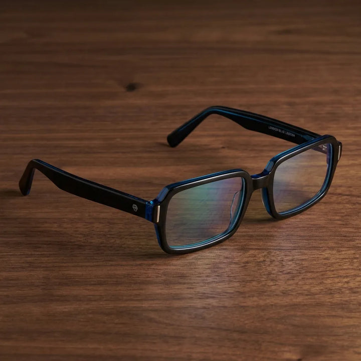 Lenses optical london acetate blue sobre escritorio wooden premium calidad premium prescription bonoboss #editorial_banner_confianza #color_azul