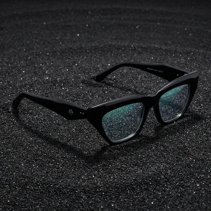 Lenses optical minerva black sobre arena volcánica texturizada diseño sustainable bonoboss #editorial_sustentabilidad #color_negro