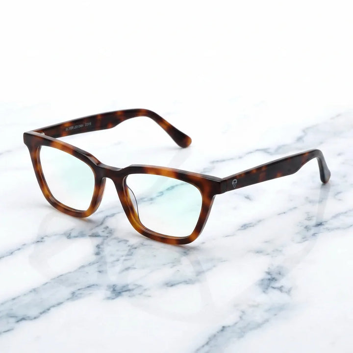 Lenses optical oliver tortoise sobre mármol white elegante frame premium bonoboss #editorial_armazon #color_carey