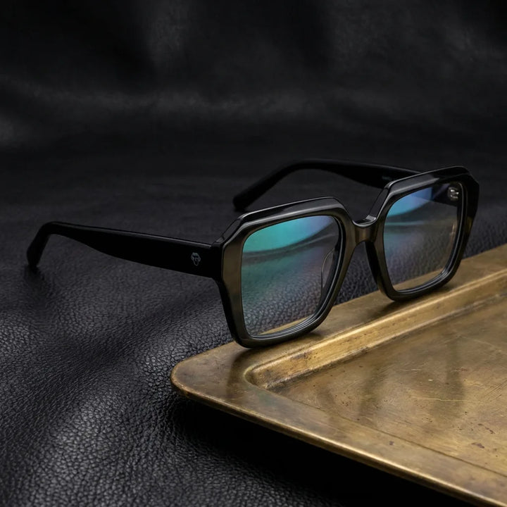 Lenses optical rapel black sobre black leather with detalle brass gold calidad premium prescription bonoboss #editorial_banner_confianza #color_negro