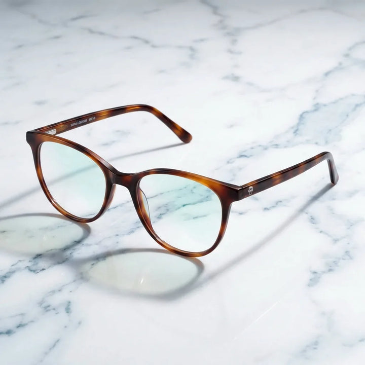 Lenses optical sofia tortoise sobre mármol white elegante frame premium bonoboss #editorial_armazon #color_carey