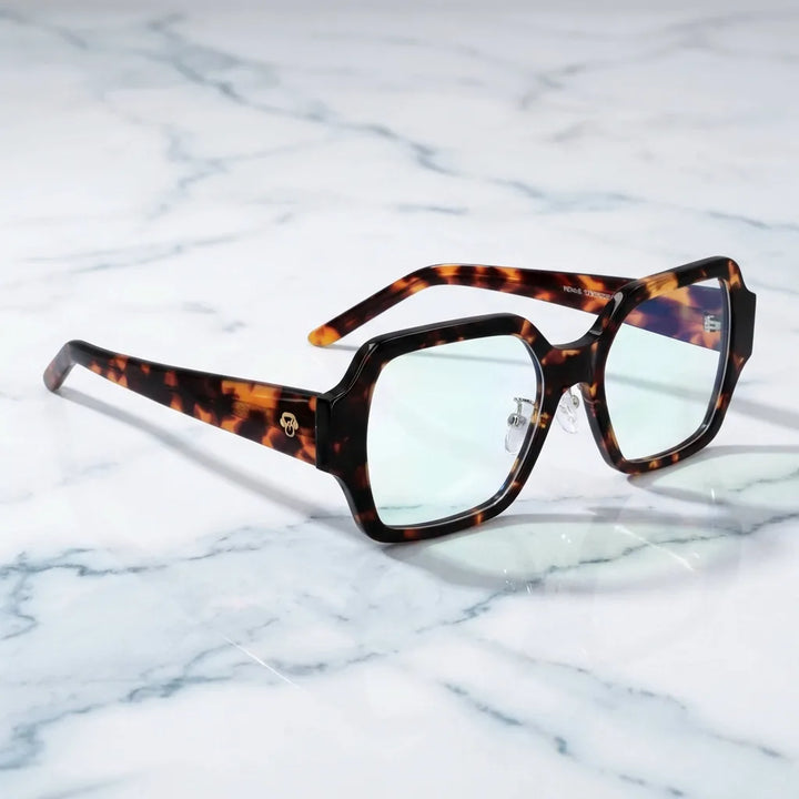 Lenses optical venus tortoise sobre mármol white elegante frame premium bonoboss #editorial_armazon #color_carey