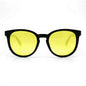 anteojos redondos de plástico reciclado y varillas de madera natural sustentable con lentes de color amarillo polarizadas y forma redonda.  #color_amarillo