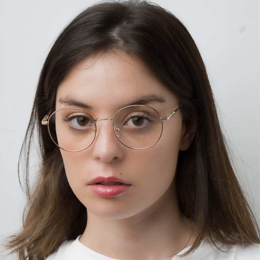 Eyeglasses or optical frames with iman or sun clip-on polarized forma round for mens and womenes. angled view and frames color gold Bonoboss #color_dorado