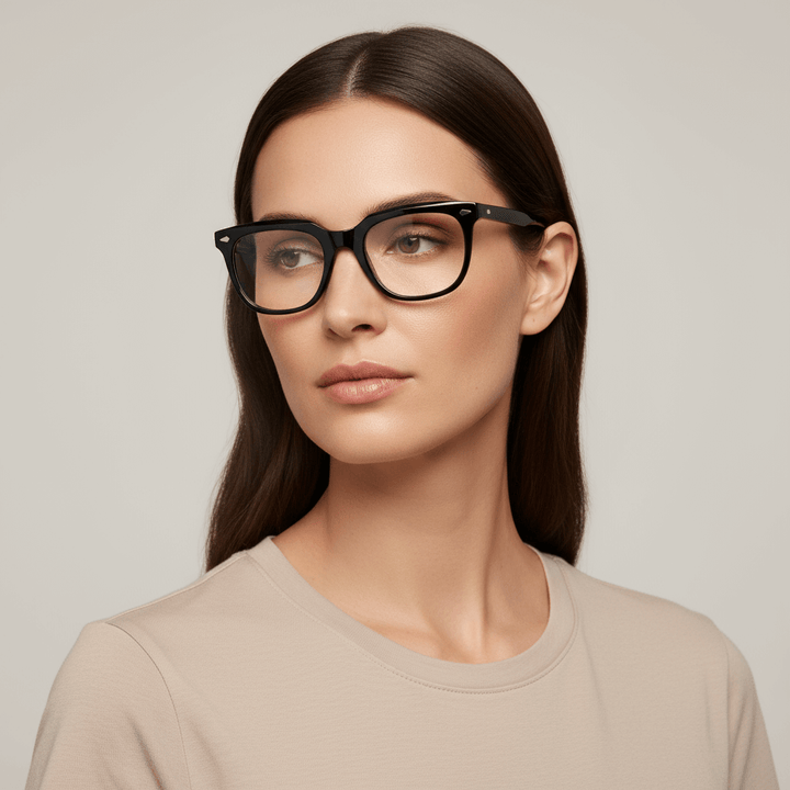 Side view a women round face and pelo liso suelto wearing eyeglasses optical frames biodegradable the marca bonoboss in sustainable acetate recycled forma rectangular cuadrada and de #color_negro